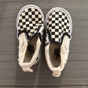 Vans Black and White Checkerboard Slip-On Sneakers